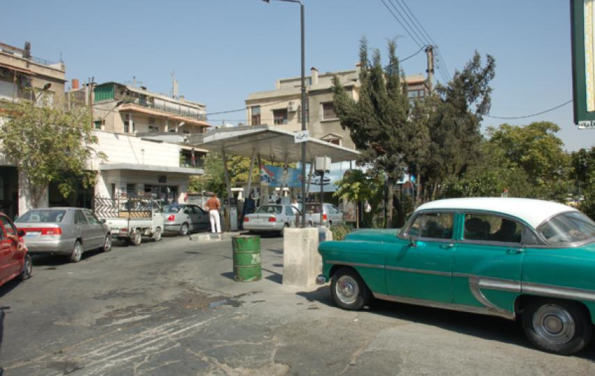 Cars queue at a petrol station in Damascus, where from next year fuel prices are set to soar as the government begins phasing out unsustainable subsidies.