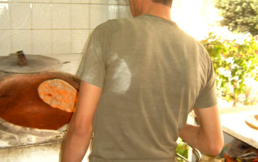 An Iraqi working illegally in a bakery in Cairo. Some Iraqis are returning home because of lack of funds.
