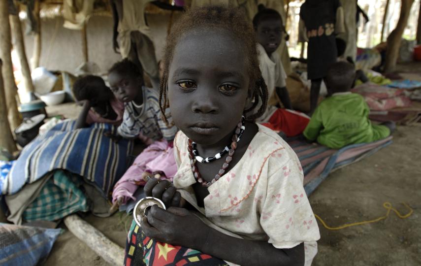 Displaced people fleeing fighting in Abyei, now in Agok. Sudan. May 2008. Clashes resumed in Abyei on 20 May, barely a week after fighting had displaced thousands of people from their homes. About 100 people were injured, according to aid workers in Juba.