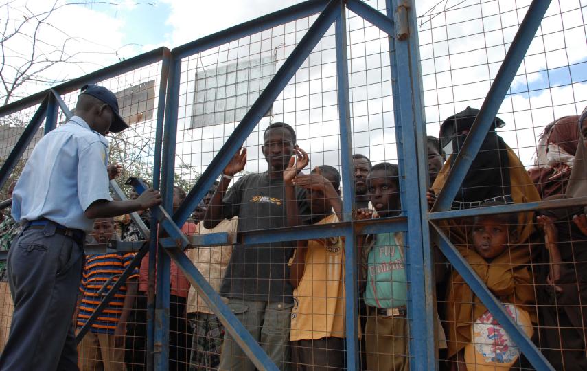 Refugees are controlled as they get into the UNHCR Dadaab camp for registration, Garissa District, Kenya August 2008.