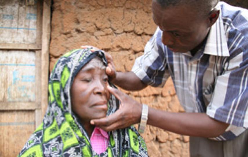 A person checked for trachoma.
