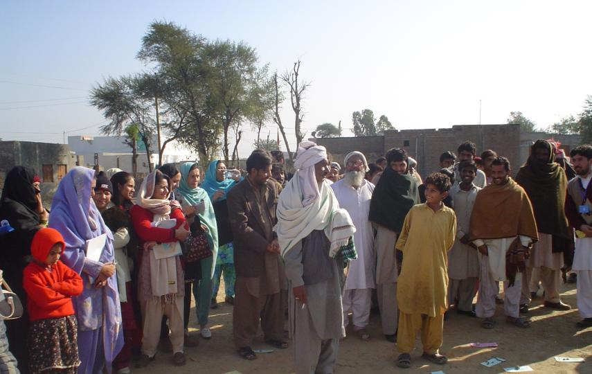 Activists explain the virtues of having indoor latrines and the problems of open defecation