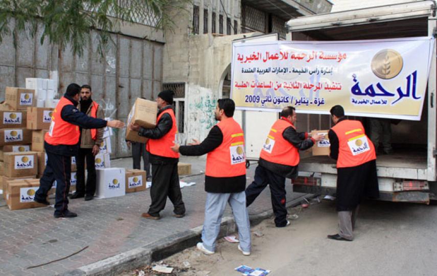 Aid workers unload desperately needed supplies in Gaza
