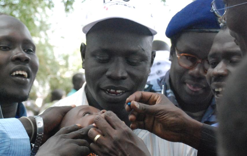 Southern Sudanese health workers give Vitamin A drops to a child in Hiyala, Eastern Equatoria, at the launch of a new 'child survival package' aimed to cut child mortality by a fifth