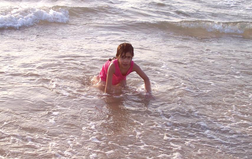 A child swims in the ‘Shalihat’ area in Gaza City despite warnings from the health ministry