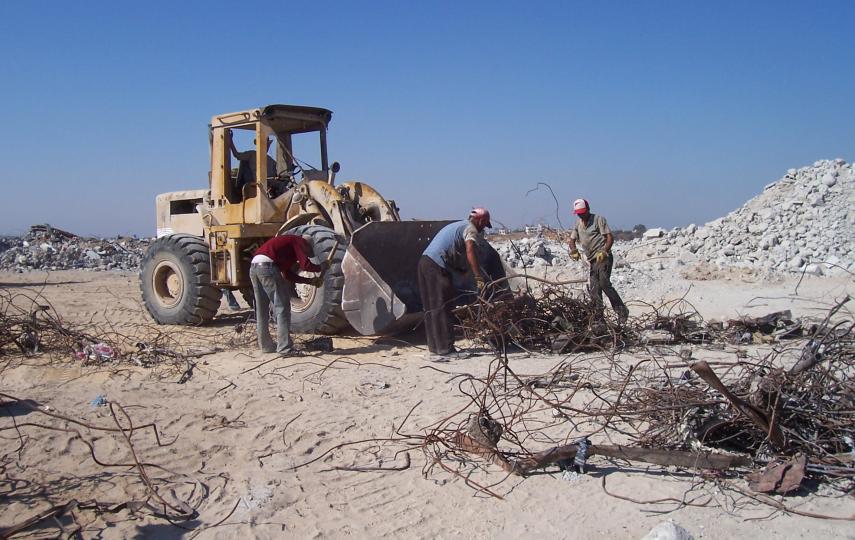 UNDP teams removing rubble containing hazardous material from a residential site in Jabalyah. About 10 percent of the rubble in Rafah and Khan Younis is asbestos material, according to UNEP