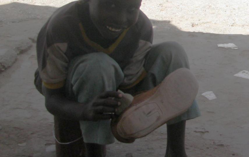 Ahmed Nour Mohamed, 9, makes a living by polishing shoes on the streets of Hargeisa, Somaliland