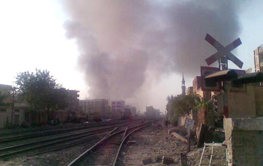 Smoke rises from the early morning burning of rice straw on a farm in Qalyubia Governorate. The smoke will drift to the city and add to Cairo’s black cloud
