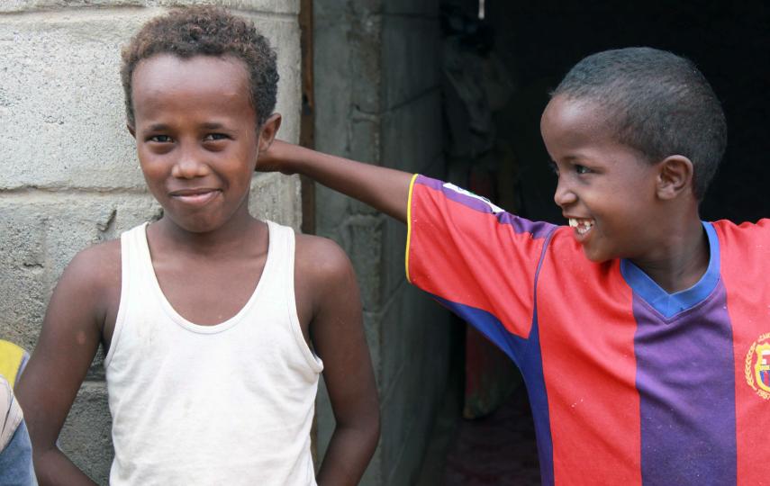 Abdi (left) an unaccompanied minor at Kharaz camp