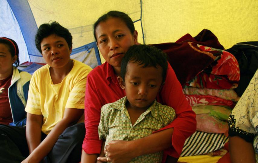 Wiwin just grabbed her four children and ran from the landslide in Bandung district