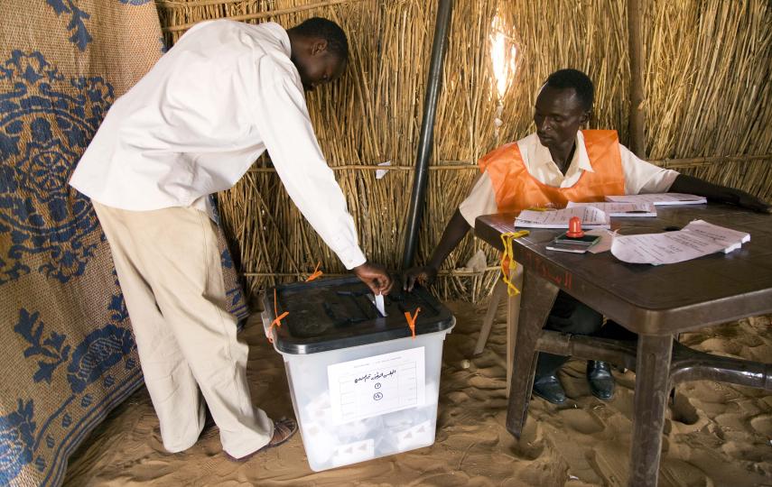 A voter in a polling station in Zam Zam IDP Camp, El Fasher (North Darfur)
