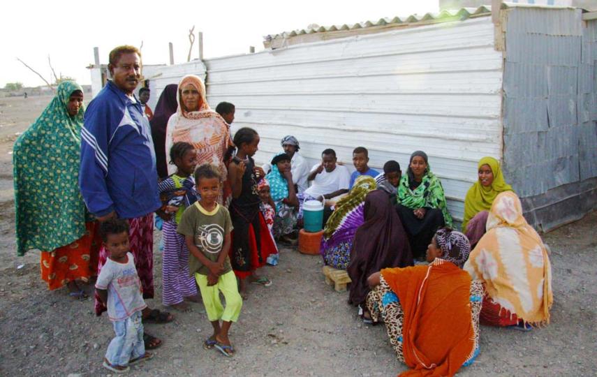 Osman Haji Abdullah, Chairman of the Grand Council in Kharaz refugee camp in southern Yemen, receives residents outside his home