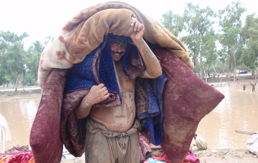 A flood-affected Afghan refugee in Pakistan