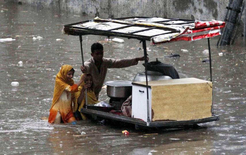 Child vendors continue to sell food in a flood-hit Punjab town amid severe food shortages