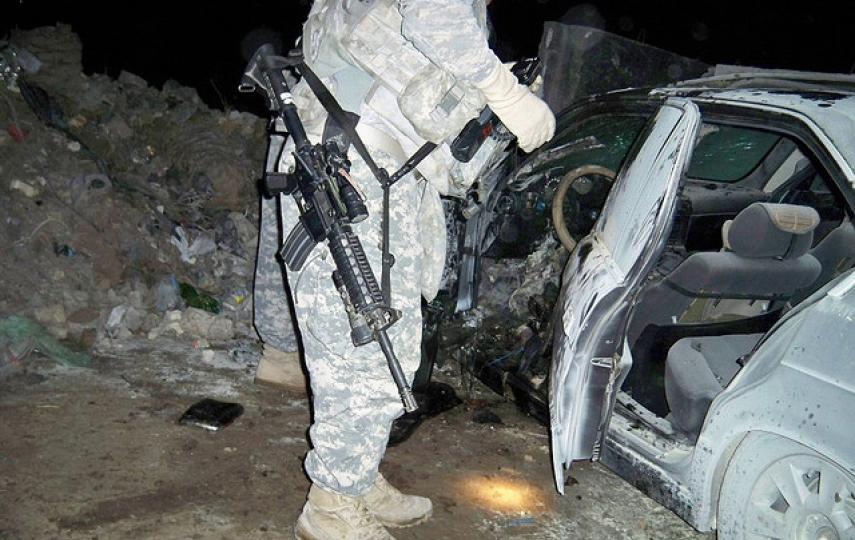 Looking for Bomb Fragments - Baghdad, Iraq