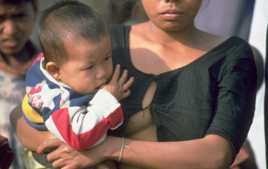 A young woman with her child in Bangladesh's Chittagong Hill Tracts. Land continues to be stolen from the Jumma tribal people by both the army, and by settlers who are supported by the government, say activists