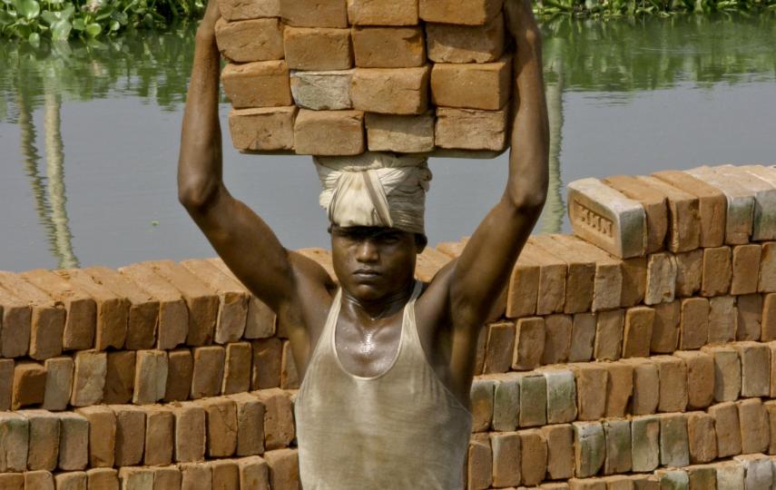 A brick kiln worker in Bangladesh. Thousand of kilns can be found throughout the country