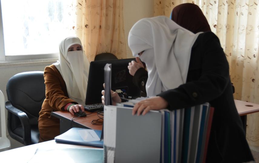 Members of the Syria Woman Association at their office in Amman. The group is made up of Syrians who fled to Jordan in the 1980s, and are now heavily involved in helping the new wave of Syrian refugees in Jordan. Its members are reportedly linked to the M