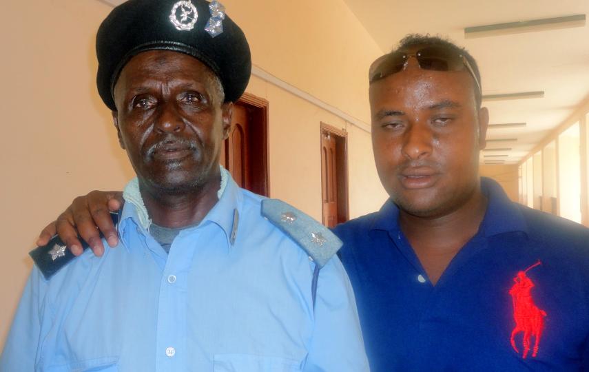 Samatar with a young Somali man
