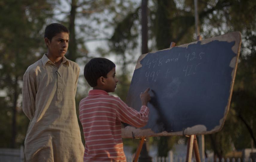 Boy attends a streetschool in Islamabad