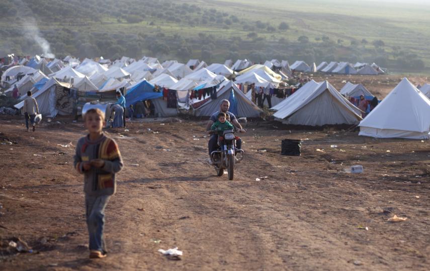 Displaced Syrians at Atma Camp on the Syrian side just over the border with Turkey on December 2, 2012. Atma has become the temporary home to more than 11,000 people who have fled the violence as war flared in Syria