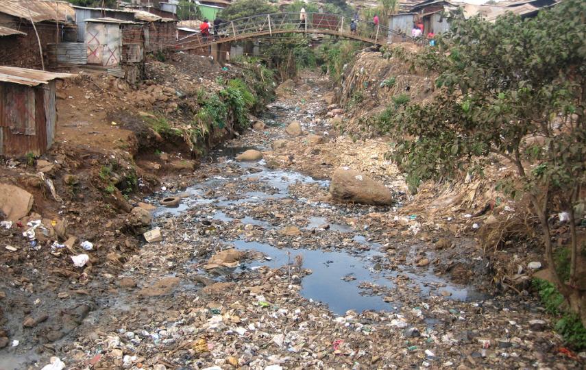 A stream in Kibera slum, used as a dump site for trash and human waste
