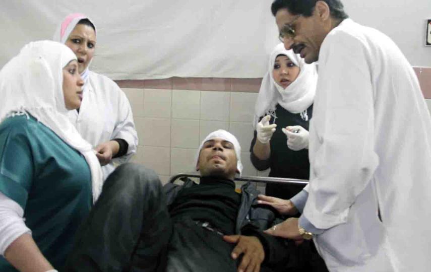 Medical staff attend to a patient at Abul Nomros Central Hospital, 25km southwest of the capital, Cairo. Rural hospitals and clinics are frequently short of medicine and doctors
