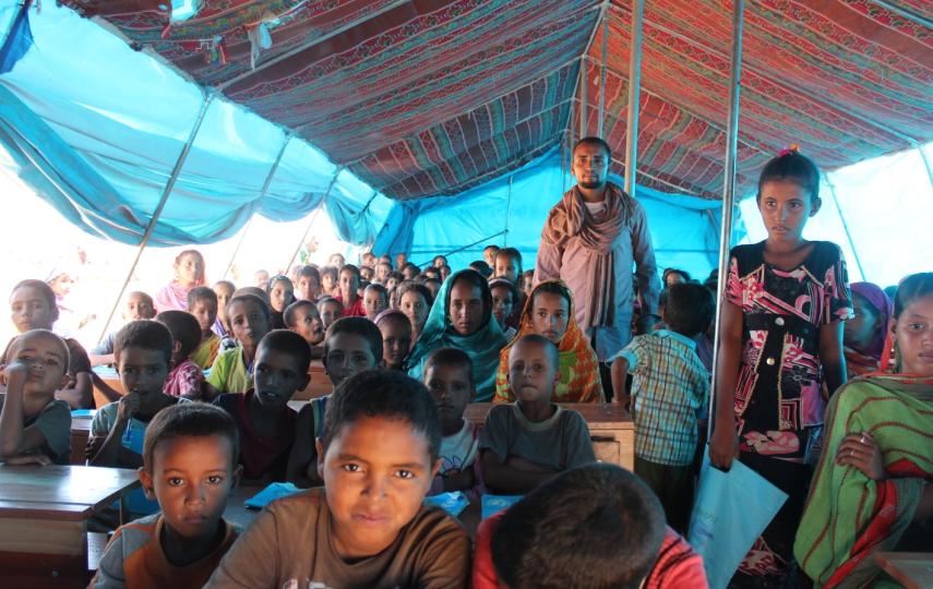 Malian teacher, Backott Ag Madelhadoui, has 340 children enrolled in his class at Mbera refugee camp in eastern Mauritania. Just over 4,000 out of 14,000 primary school-age children are enrolled in schools in the camp according to UNICEF (November 2013 st