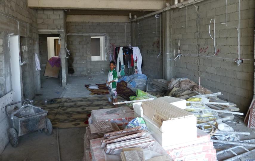 About 45 IDPs from Tikrit are now living in this open-fronted, half-built hotel building in the shadow of Erbil’s ancient citadel, in the semi-autonomous Kurdish region of Iraq. Militant advances in central Iraq in June 2014 caused an additional 500,000