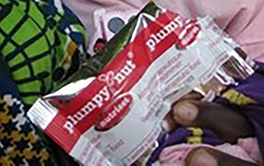 [Niger] Child being treated with Plumpy'Nut nutritional wonderfood, Sansane Haoussa, southwest Niger. [Date picture taken: 08/23/2006]