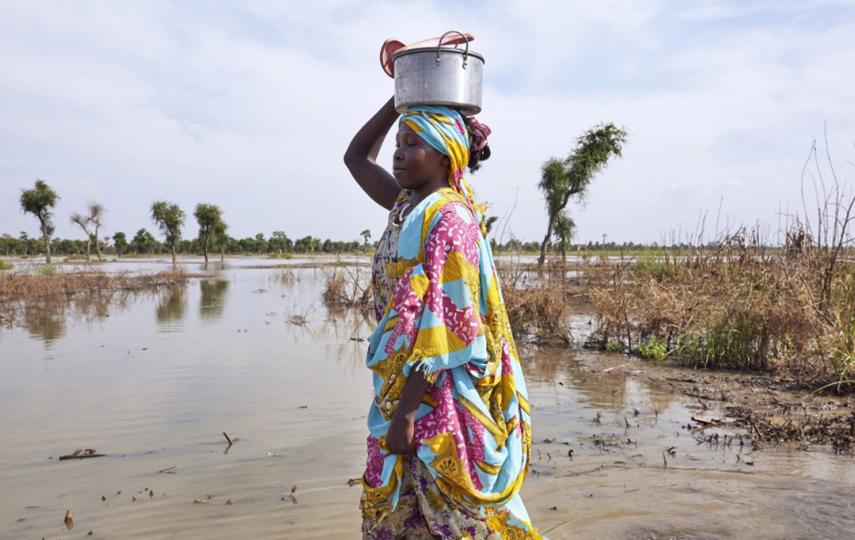 A woman walks through floodwaters in Maban, South Sudan, where large areas have been inundated by heavy rains in recent months.