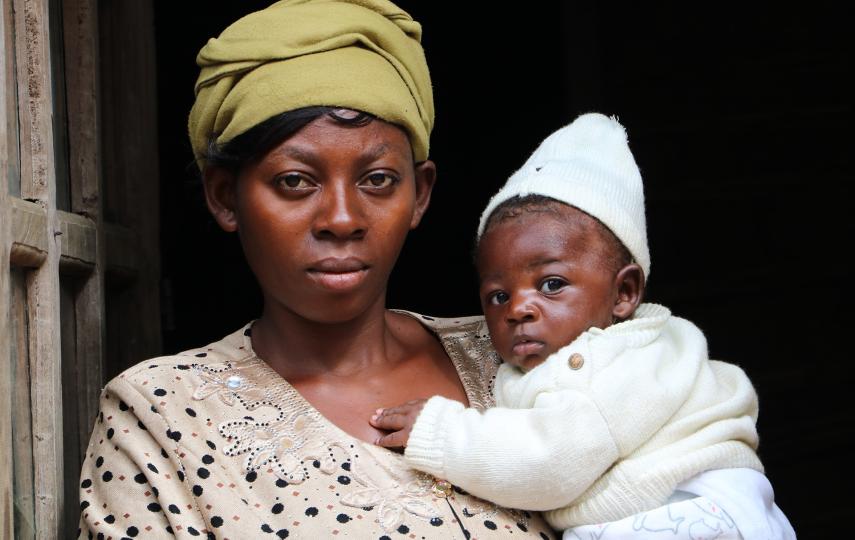 Ebola survivor Rachel Kavughokahuko nurses her two-month old son in her house in Congo's town of Beni.