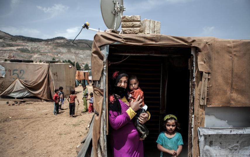 An unregistered Syrian refugee family, originally from Aleppo, in an informal settlement in Lebanon's eastern Bekaa Valley