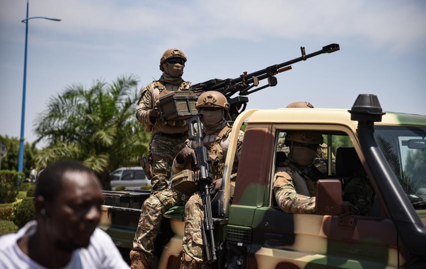 A Malian army pick-up arrives at the airport in Bamako in May 2021. Despite a slew of well-documented cases of rights violations by the Malian army, European governments still provide military assistance worth millions of euros a year. 