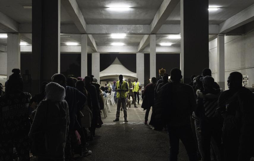 Migrants who have decided to make their voluntary return from Libya to Nigeria queuing at the airport for the triage. Lagos, Nigeria, 2020.