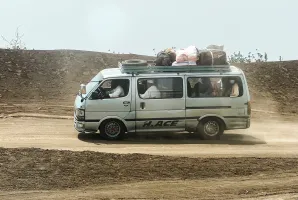 Families flee RSF advances in Sudan's El Gezira state, on Sennar Road in the city of al-Dinder, Sennar state, Sudan, June 12, 2024.