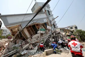 Members of the Chinese Red Cross International Emergency Response Team work at a collapsed residential building following the earthquake, in Mandalay, Myanmar March 31, 2025. 