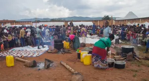 Burundian volunteers prepare food for Congolese families at Rugombo Stadium, after Congolese fled from renewed clashes between M23 rebels and the Armed Forces of the Democratic Republic of the Congo (FARDC), in Rugombo commune of Cibitoke Province, Burundi February 18, 2025.