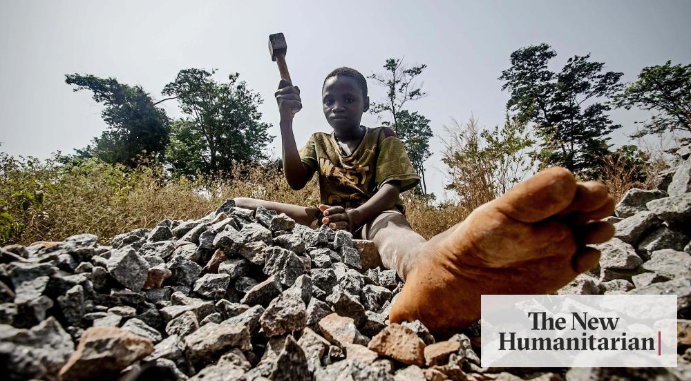 Children break rocks to pay for school in Sierra Leone