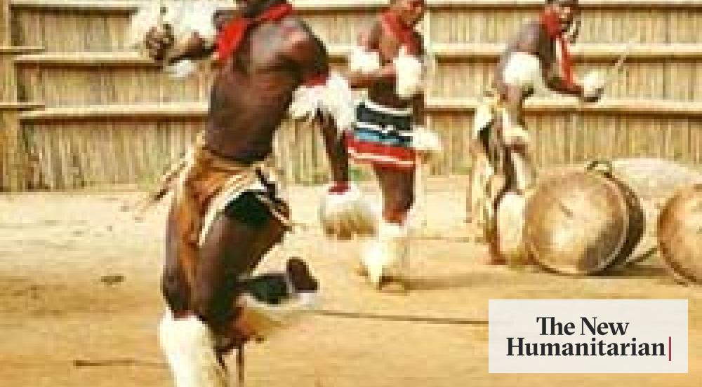 Zulu men demonstrating traditional fighting with sticks, Stock