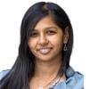 A headshot of Anjali Mazumder.