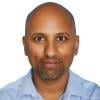 A headshot of Sriram Shamasunder.
