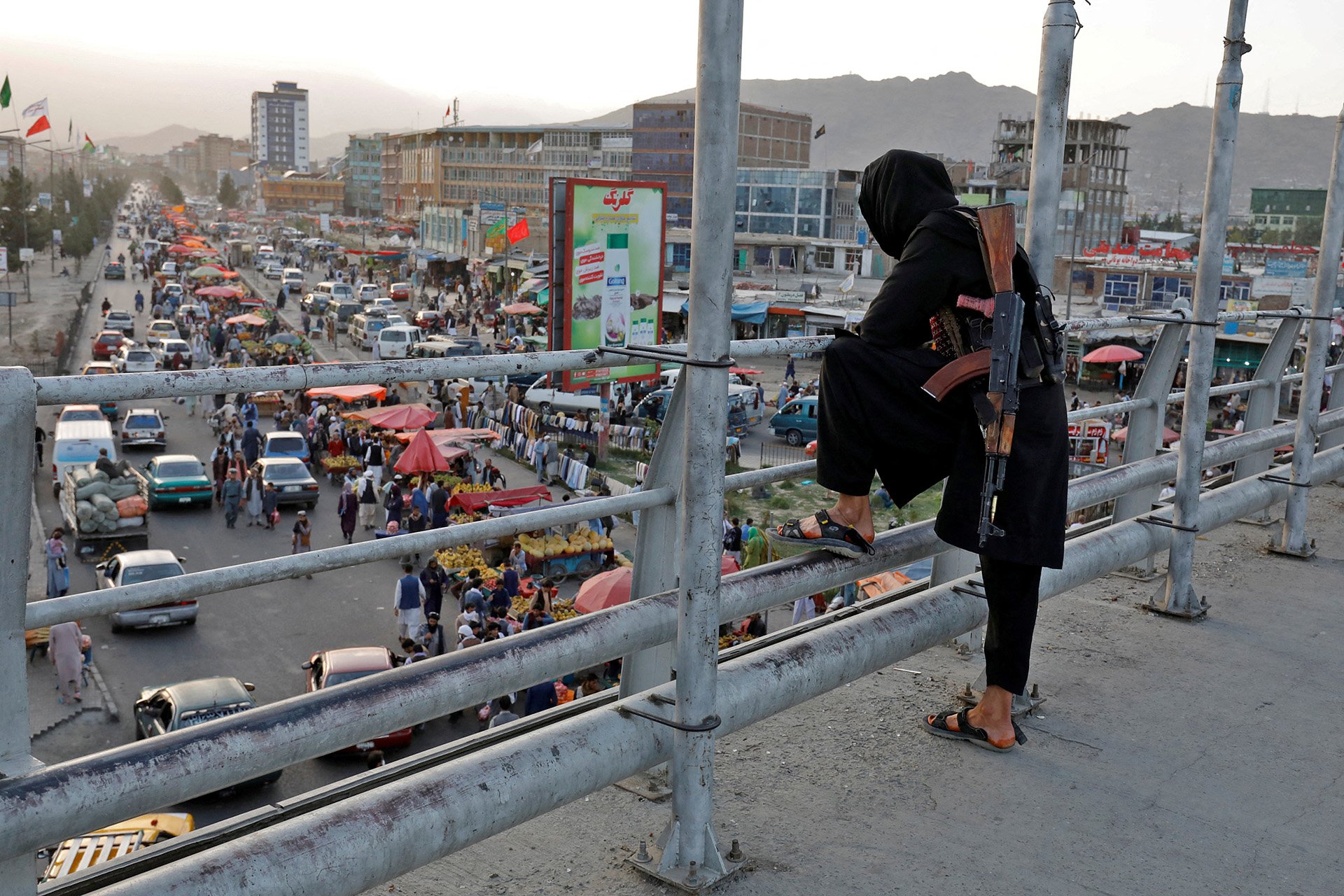 A member of the Taliban on a bridge in Kabul, on 6 August 2022. 