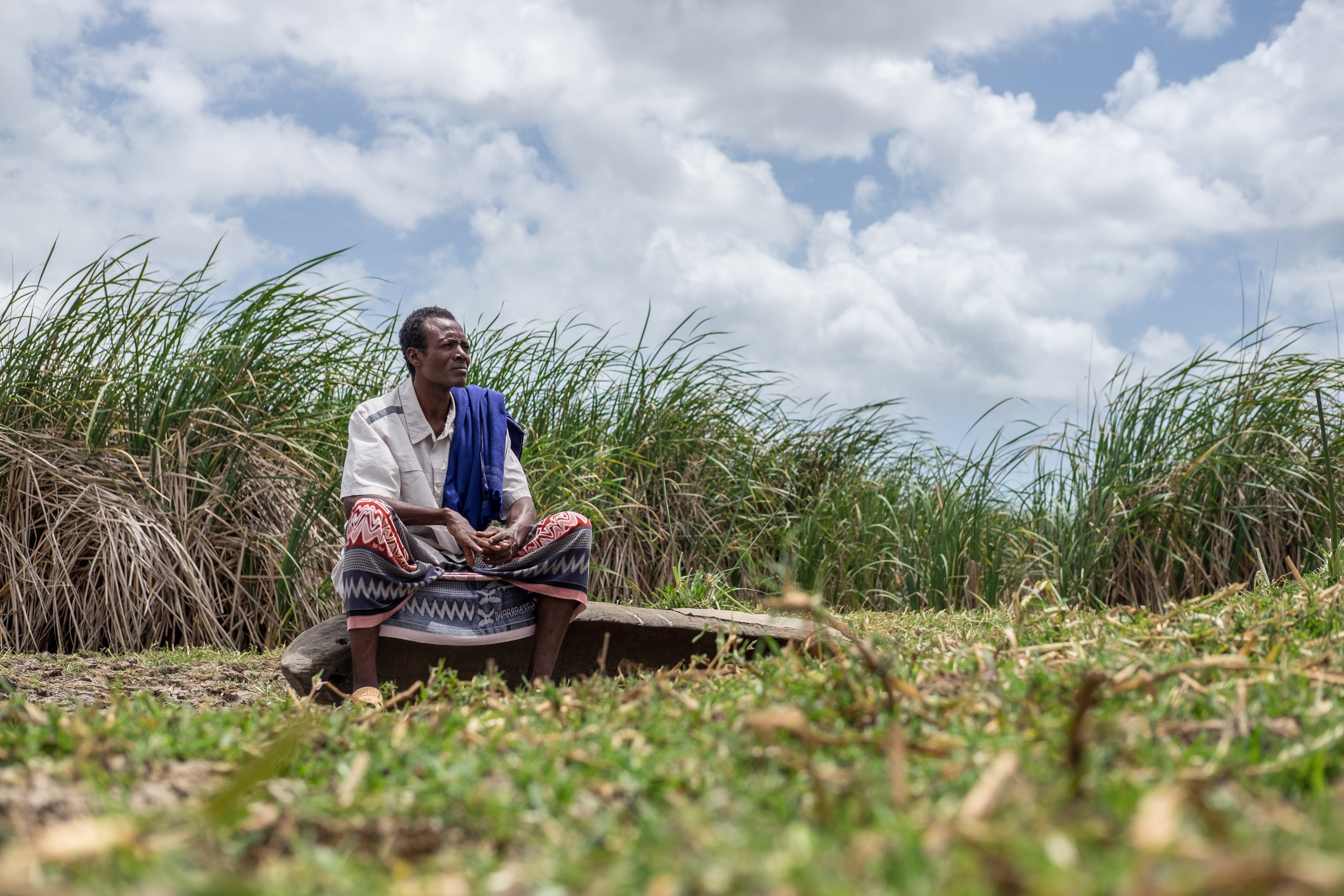 Guyole Elema sits on a canoe outside the town of Reketa.