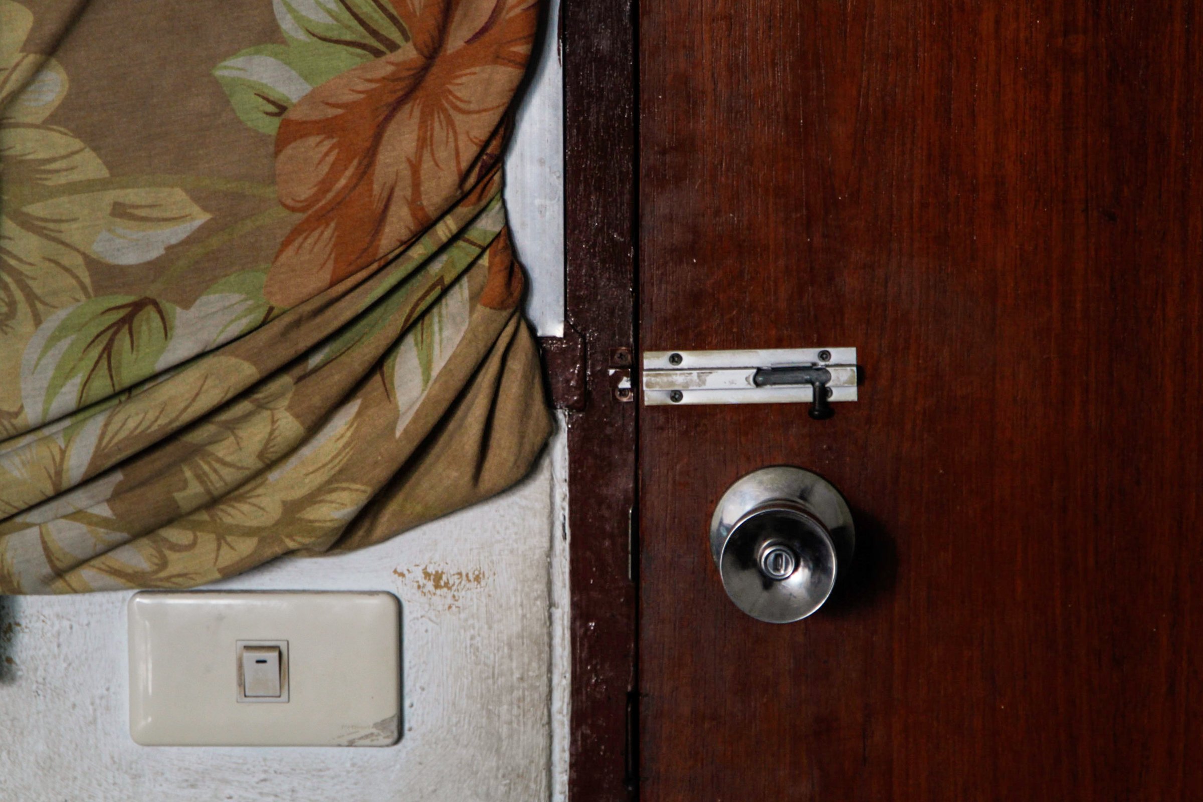 Photo of a closed door inside an apartment