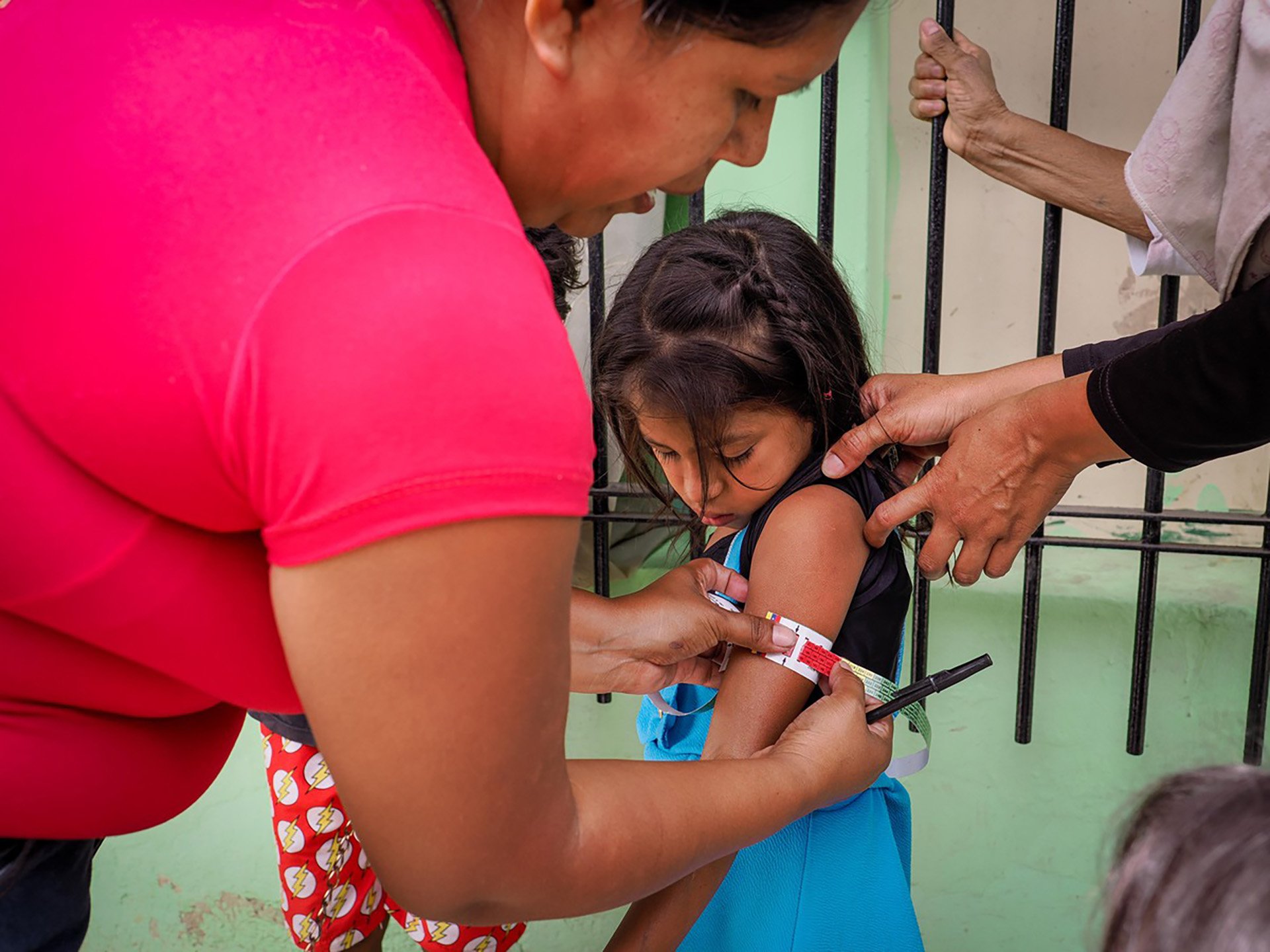 A child being tested for malnutrition in Asociación Civil Oportunidad, an NGO that provides medical support to vulnerable residents in poor Caracas neighbourhoods.