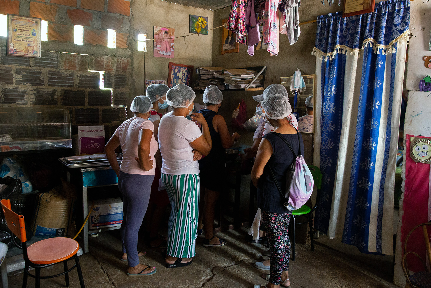 A group of gender-based violence survivors participate in a baking course at the home of Yazmín Zulrina Pinzón Ramírez in Cúcuta, Colombia on 19 September 2021.